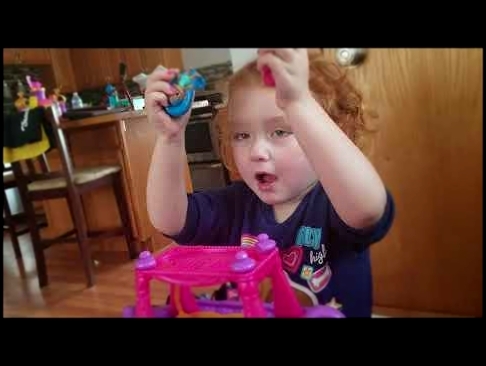 Madyson playing with Shimmer and Shine 