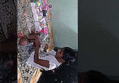 Pujitha playing  with Barbie dolls 